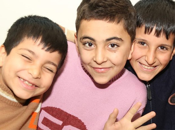 Photos of three Lebanese boys