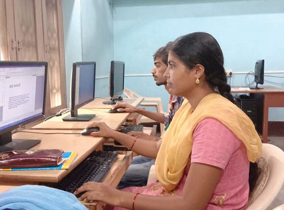 Photo of computer skills training students