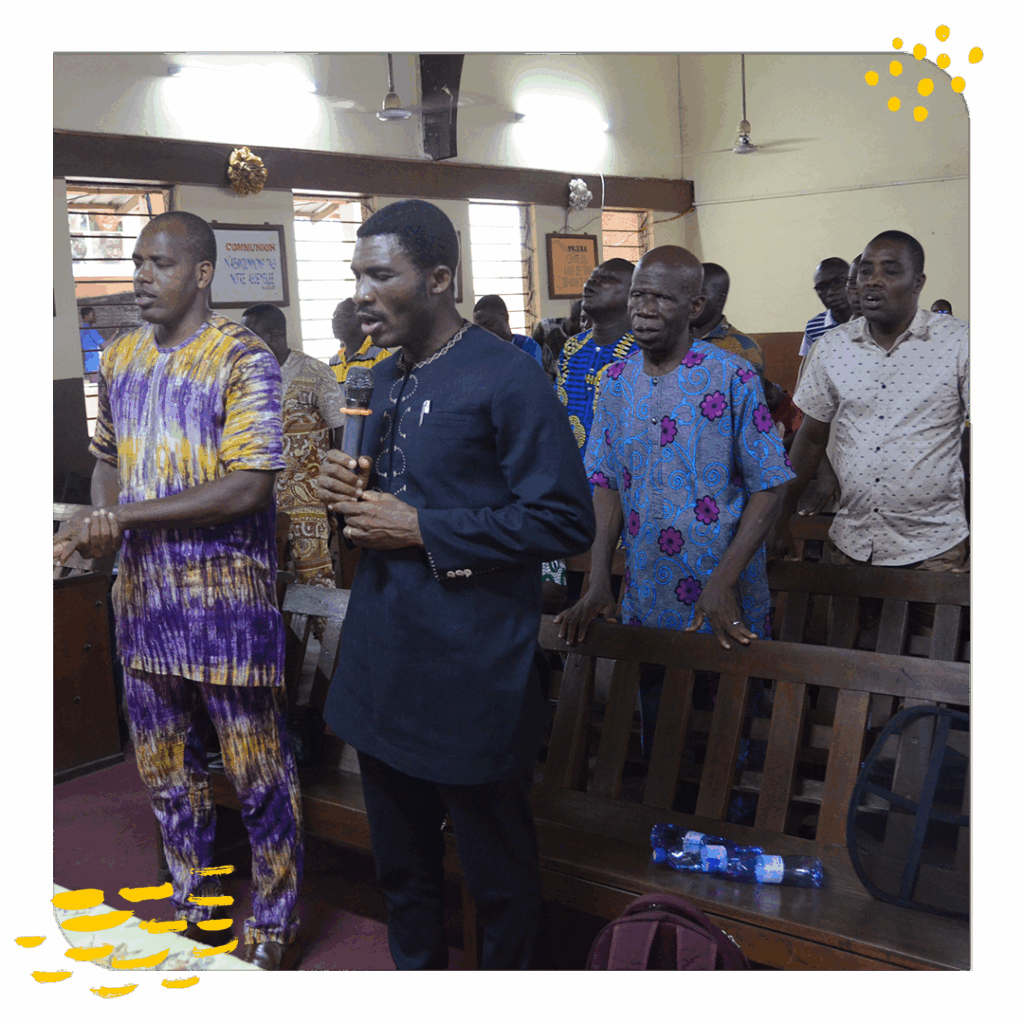 Church interior with worshipping congregation